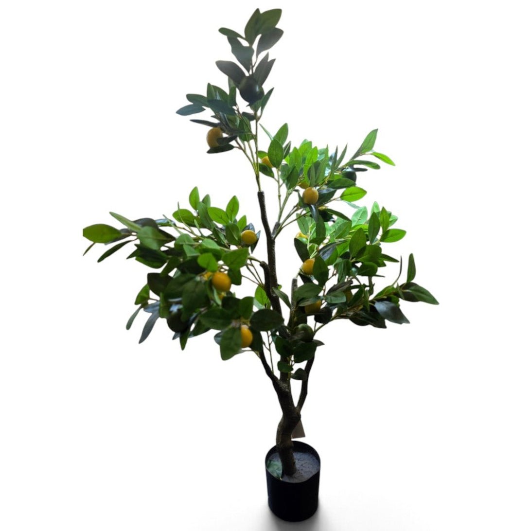 An artificial potted citrus tree with green leaves and small yellow fruits, in a black cylindrical pot, set against a plain white background.