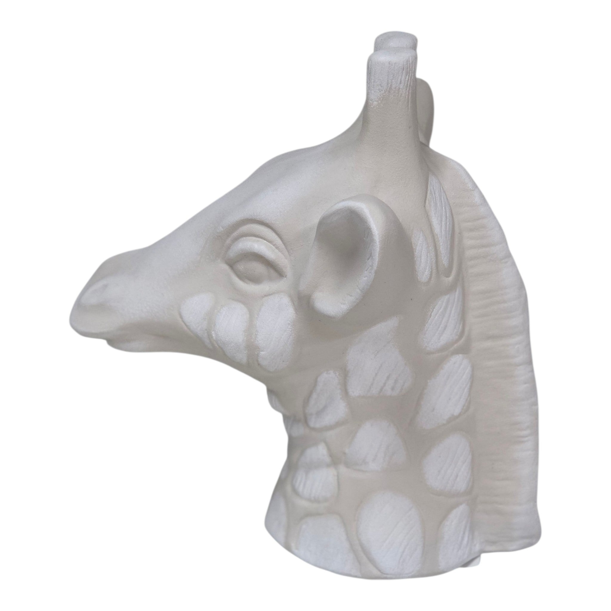 A white giraffe head and neck figurine with textured spots, shown in profile against a plain white background.